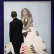 Former President Barack Obama looks at former first lady Michelle Obama’s portrait. (Mark Wilson/Getty Images)